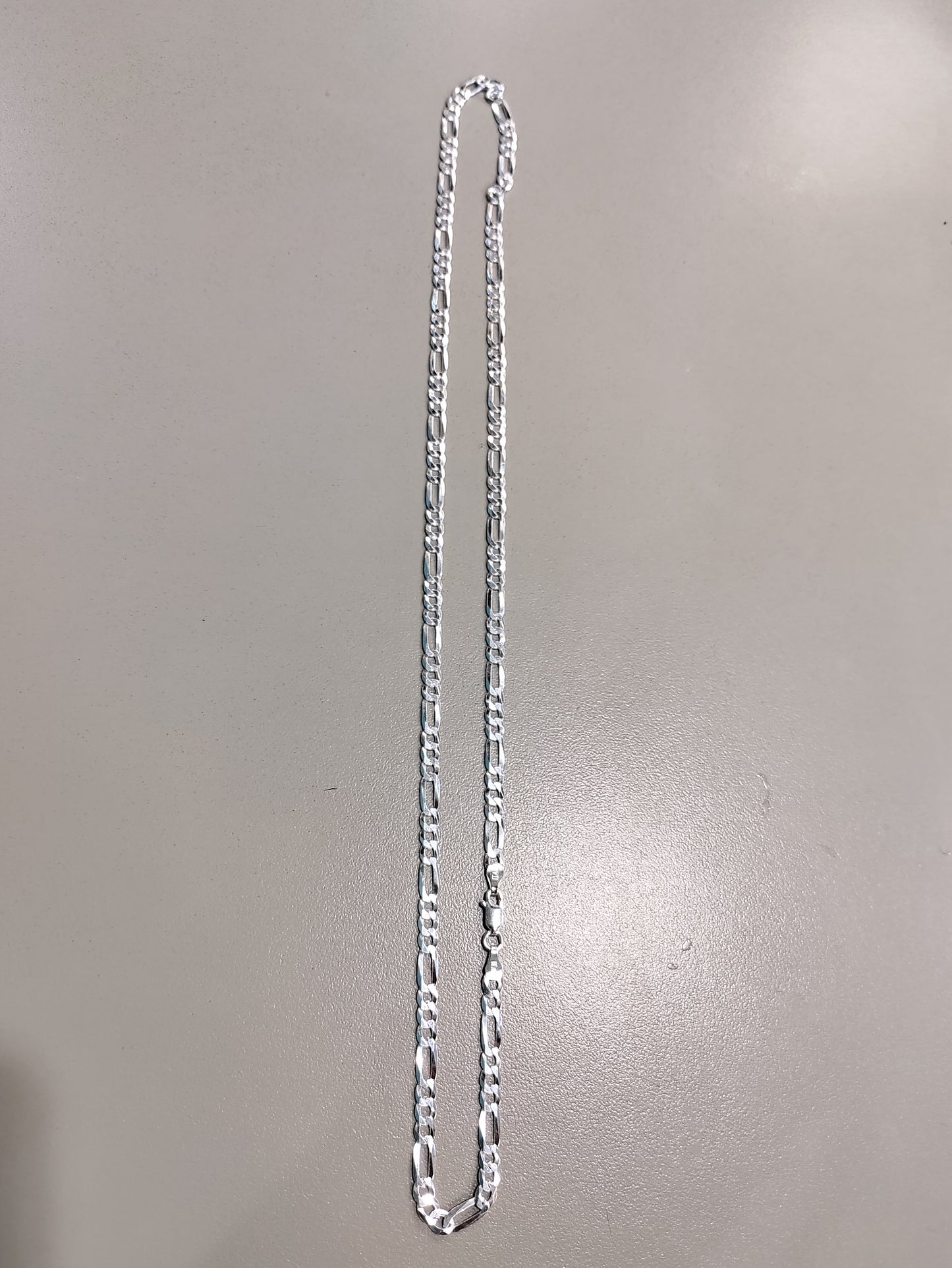 Silver Figaro chain